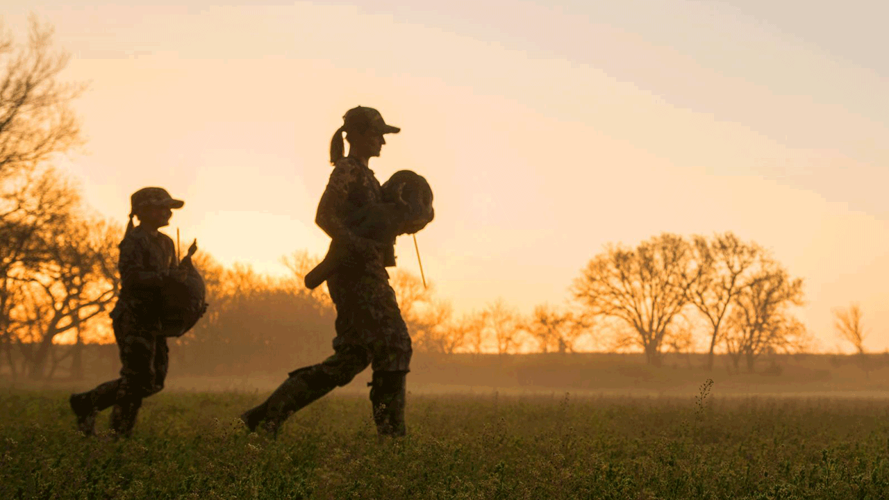 mom and daughter in field