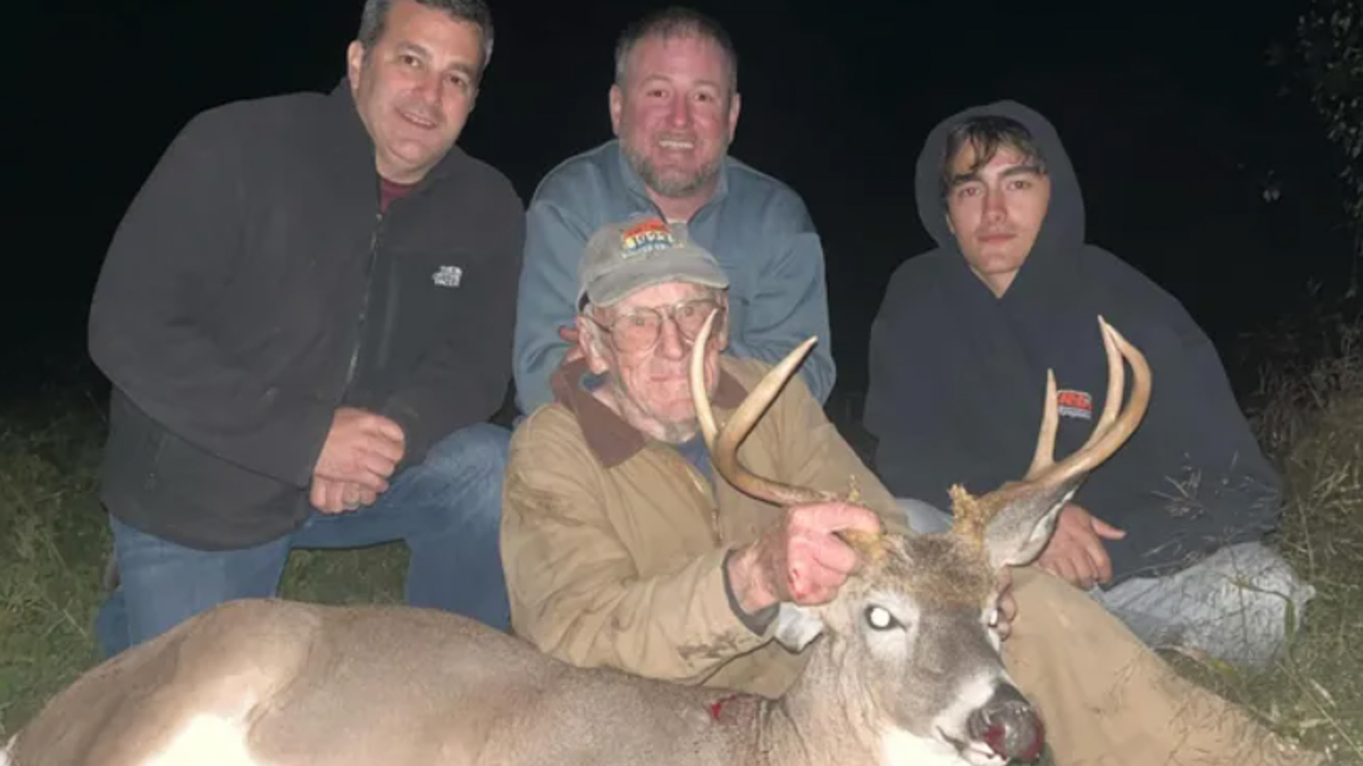 101 Year Old Bowhunter with his buck and family